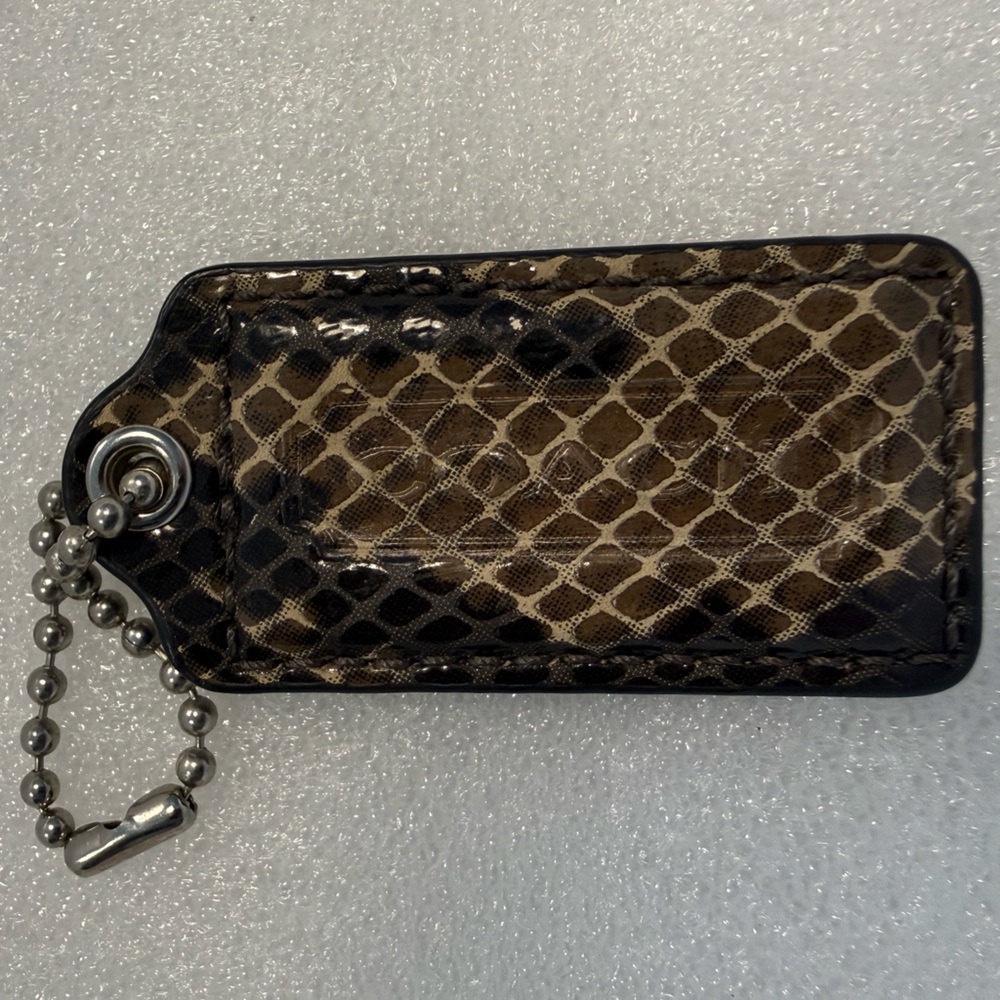 Coach (✨B1G1 1/2 off) Python Embossed Hangtag